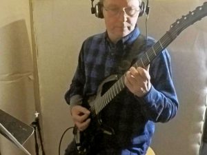 Les Fish playing guitar on Carla Howell music at Wellspring Sound Studio